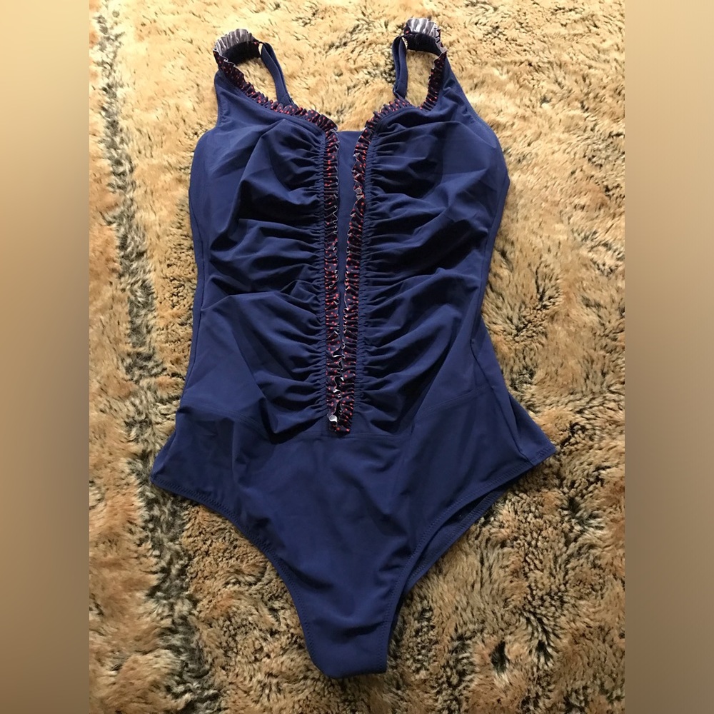 Very flattering & great quality!  One piece NAVY blue red polka dots by Anita.